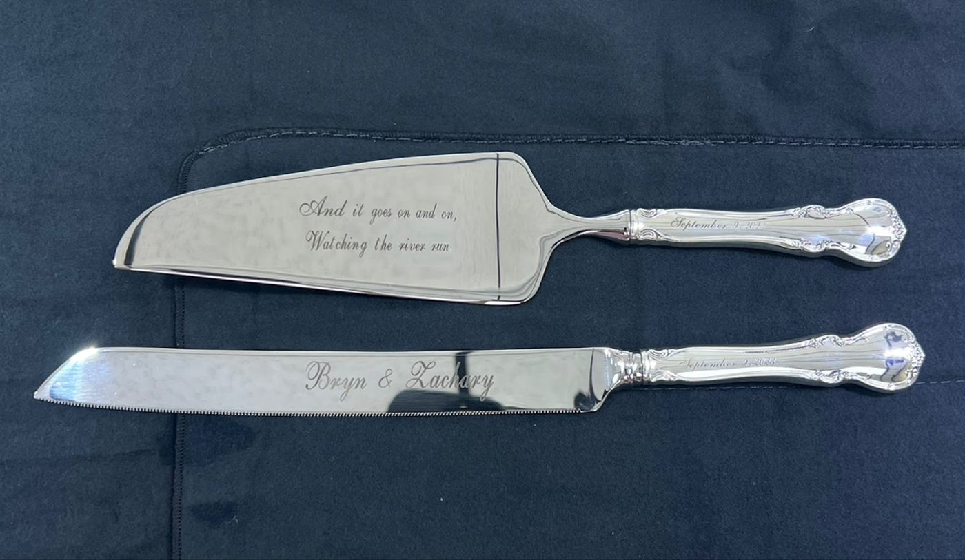 Silver cake knife and server engraved for a wedding, in a presentation box