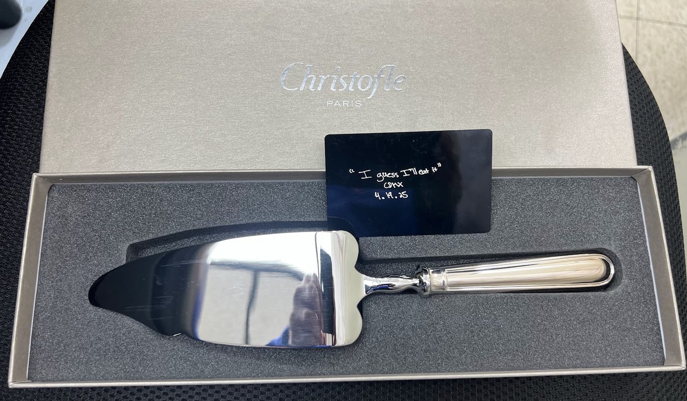 Silver cake server engraved with a couple details in a gift box