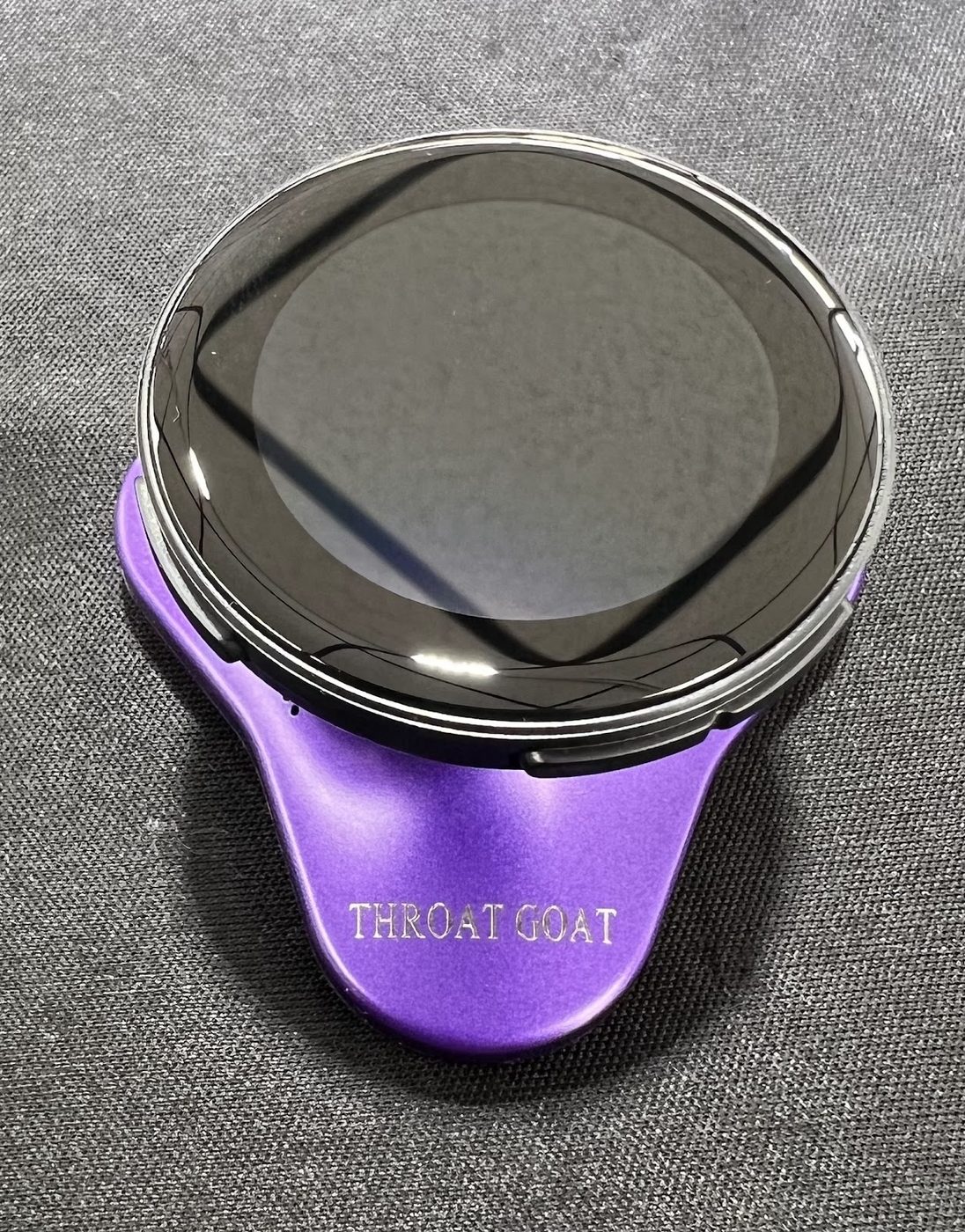 Purple insulated flask with engraved lettering on the base