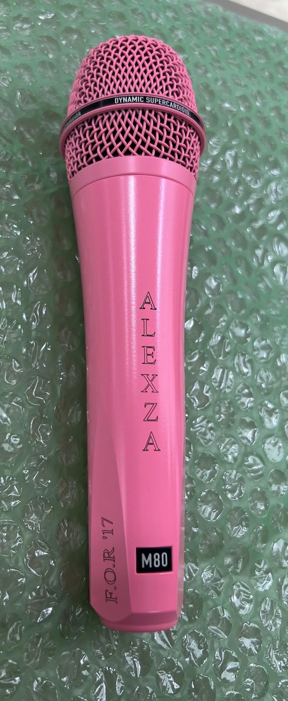 Pink microphone engraved with a name