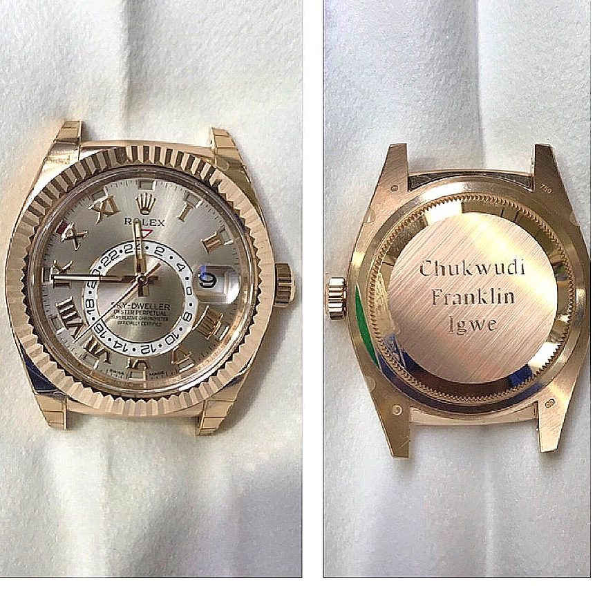 Rose gold Rolex Sky-Dweller shown front and back with a personal message engraved on the case back