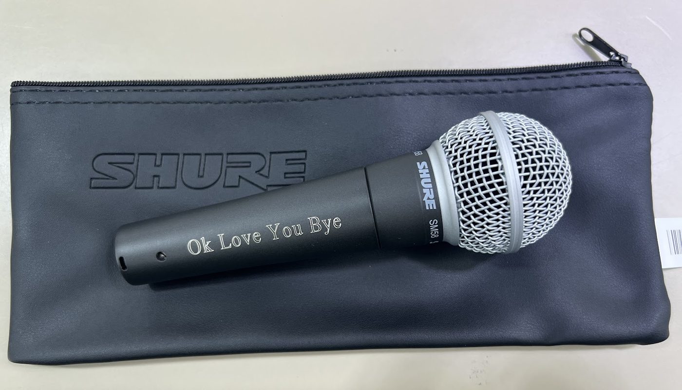 Engraved Shure microphone with a matching engraved zip case