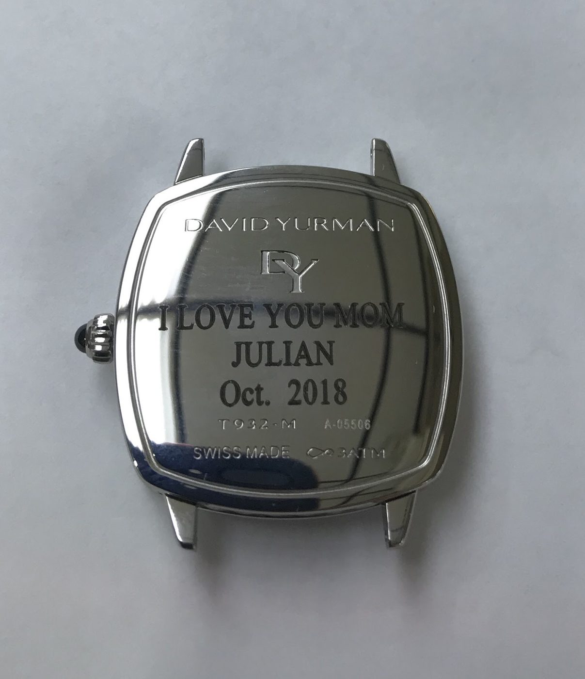 Vintage watch case engraved with a personal message and the date October 2018