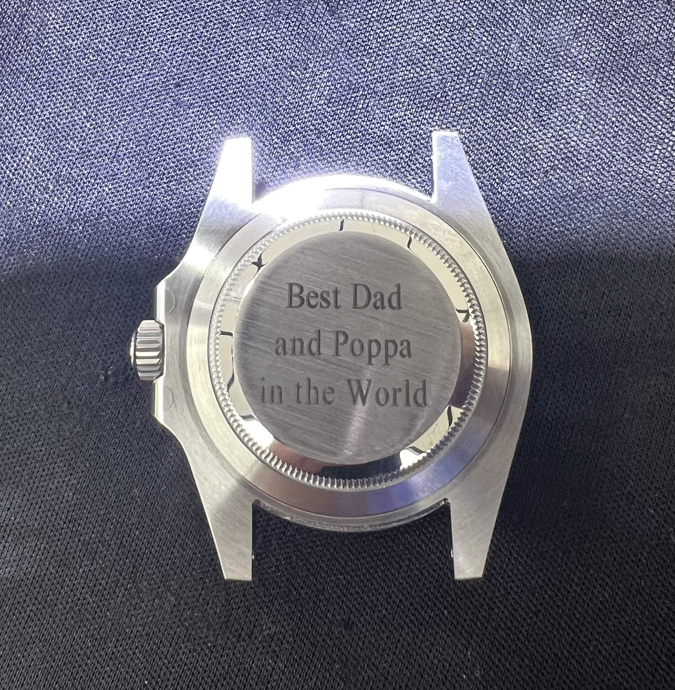 Watch case back hand engraved with the words Best Dad and Poppa in the World